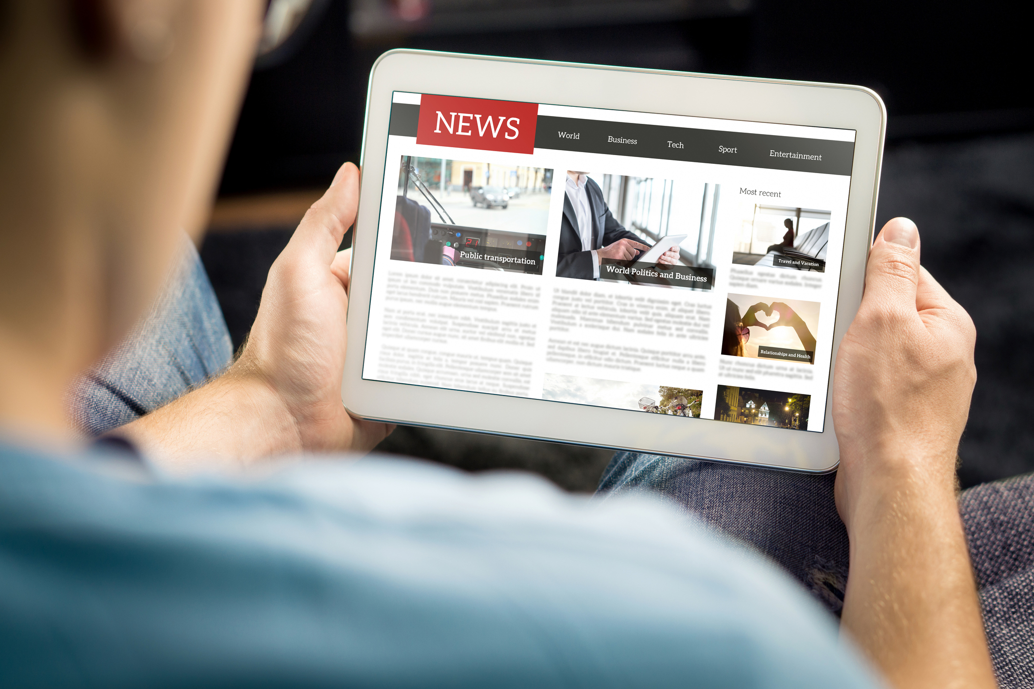 Person viewing a news website on a tablet